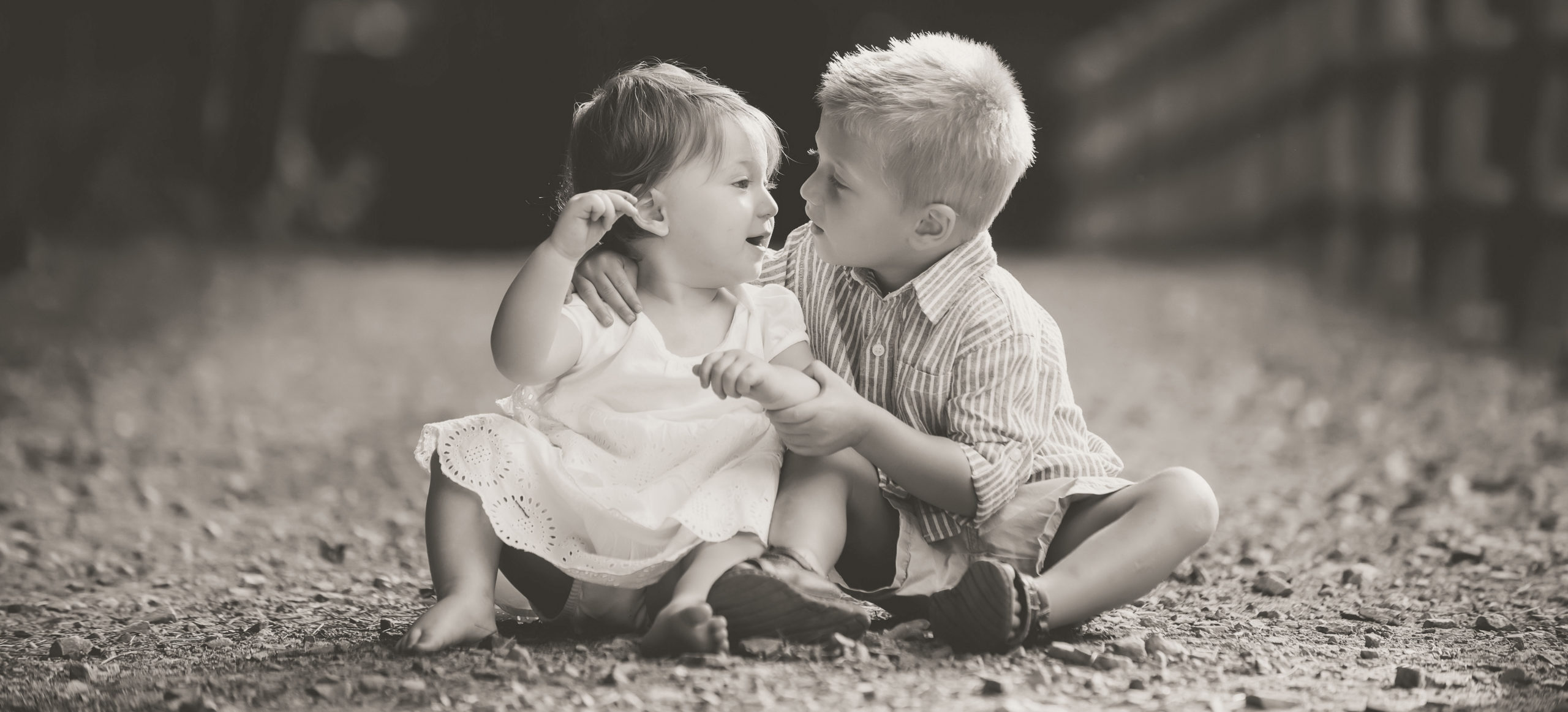 brother and sister hugging at charlotte family session