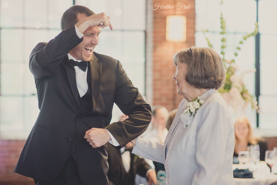 groom gets grandma to dance at wedding